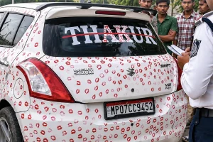 boy_with_lipstick_marks_on_the_car_02